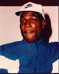Frank Bruno photo print wearing a Nike hat and blue windbreaker