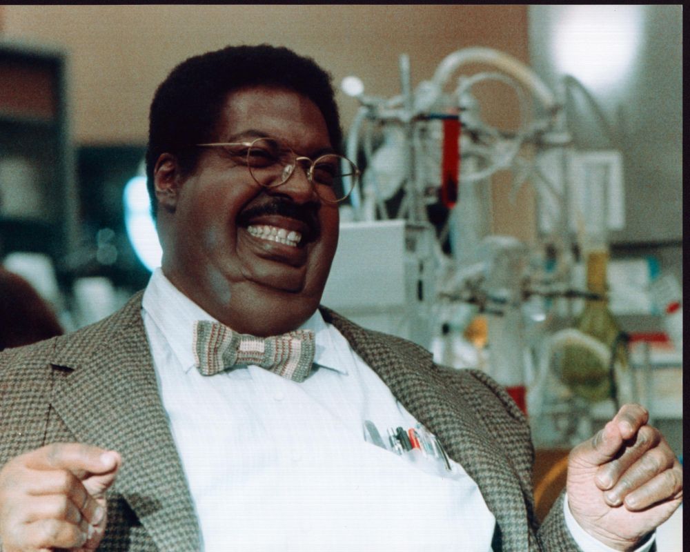 Eddie Murphy laughing in The Nutty Professor photo print, vibrant and colorful.