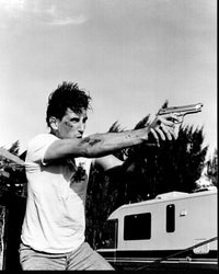 William Baldwin Shooting Gun in Fair Game - Black and White Photo Print