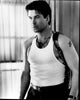 Alec Baldwin wearing a gun holster in a black and white photo print