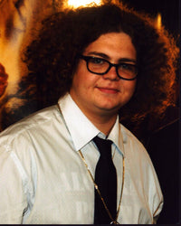 Jack Osbourne photo print in shirt and tie with gold necklace.