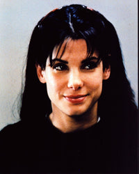 Close-up photo print of Sandra Bullock in black top.