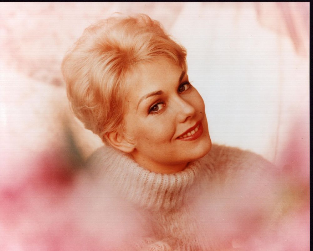 Kim Novak headshot photo print in white turtleneck, elegant film star portrait.