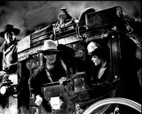 Black and white photo print of George Bancroft, John Wayne, and Louise Platt in Stagecoach