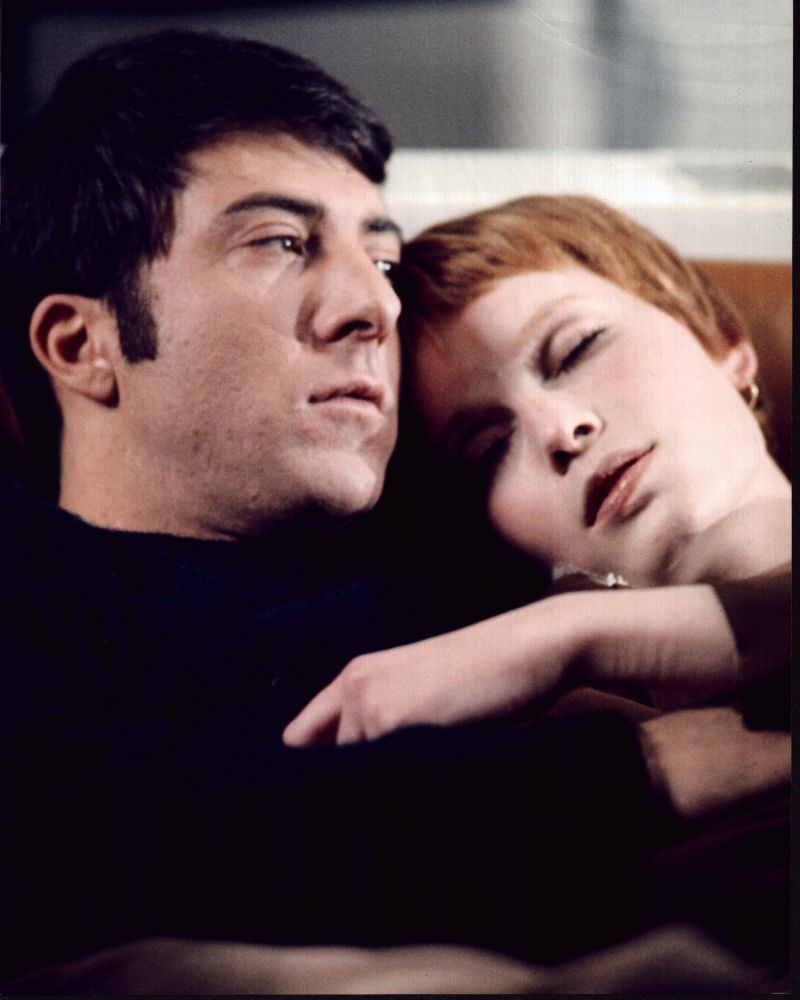 Dustin Hoffman and Mia Farrow cuddling in John and Mary photo print.