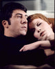 Dustin Hoffman and Mia Farrow cuddling in John and Mary photo print.