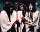 Kiss Band In White Robes With Red Candles Photo Print