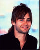 Jared Leto smiling in black top photo print