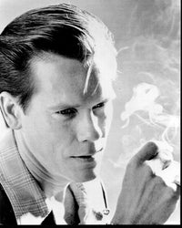 Black and white photo print of Kevin Bacon smoking.