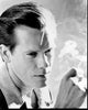 Black and white photo print of Kevin Bacon smoking.