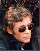 Peter O'Toole wearing sunglasses in grass - vintage photo print.