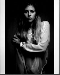 Hermione Corfield black and white photo print wearing a sheer top.