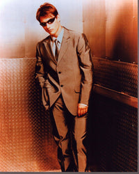 Tom Cruise photo print in suit and sunglasses in an elevator