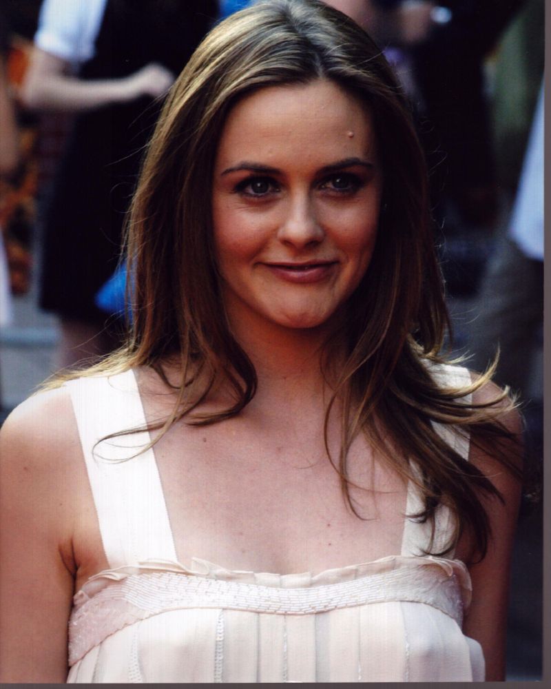 Alicia Silverstone photo print in light pink top, showcasing her elegance.