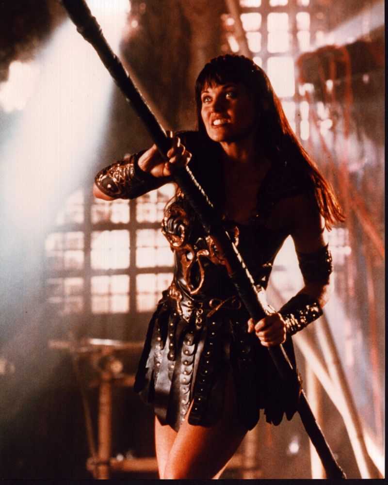 Lucy Lawless as Xena: Warrior Princess photo print featuring her with a spear.