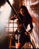 Lucy Lawless as Xena: Warrior Princess photo print featuring her with a spear.