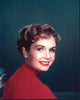 Debbie Reynolds in a red sweater photo print, iconic Hollywood style.
