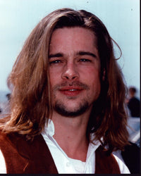 Brad Pitt in Brown Vest Photo Print showcasing Hollywood style.