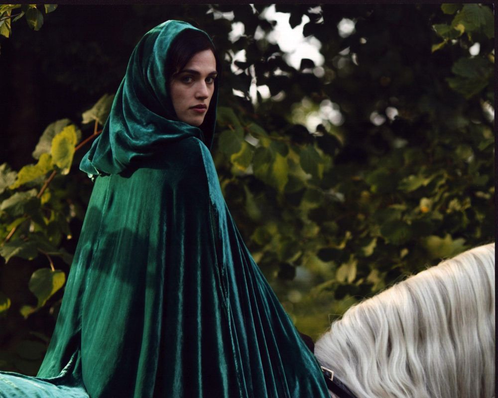 Katie McGrath on horseback in green cape from Merlin photo print