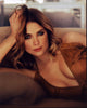 Ashley Benson laying on side in brown top photo print