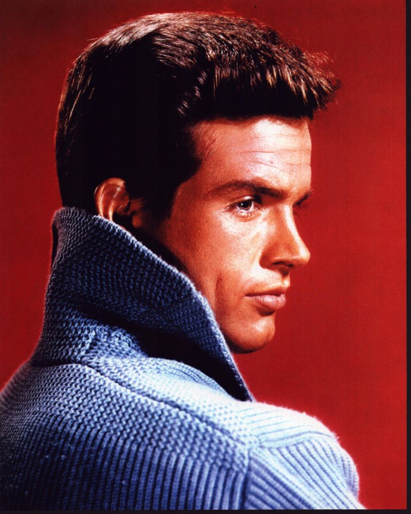 Warren Beatty looking over shoulder in blue sweater photo print.