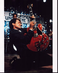 Michael J. Fox Playing Guitar in Back to the Future Photo Print