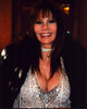 Barbara Luna photo print in sequin top and black jacket.