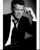 David Foster black and white photo print in suit and tie.