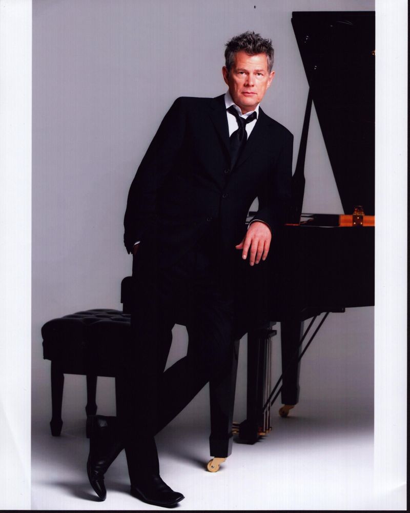 David Foster Leaning On Piano Photo Print showcasing musical artistry.