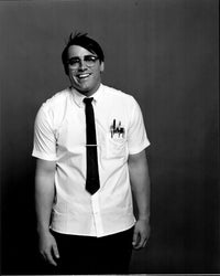 Matt LeBlanc black and white photo print in shirt and tie with glasses.