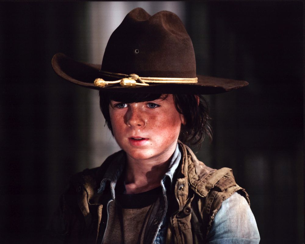 Chandler Riggs Photo Print from The Walking Dead, showcasing Carl Grimes.