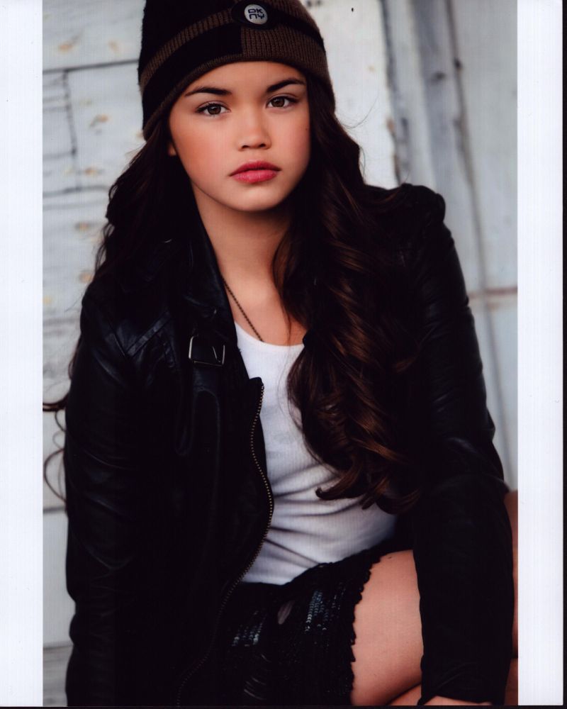 Paris Berelc photo print wearing leather jacket and knit hat.