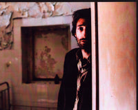 Adrien Brody in doorway scene from The Pianist photo print.