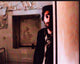 Adrien Brody in doorway scene from The Pianist photo print.