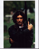 Antonio Banderas in black jacket holding gun in Assassins photo print