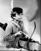 Black and white photo of Tommy Cook in costume with bow and arrow