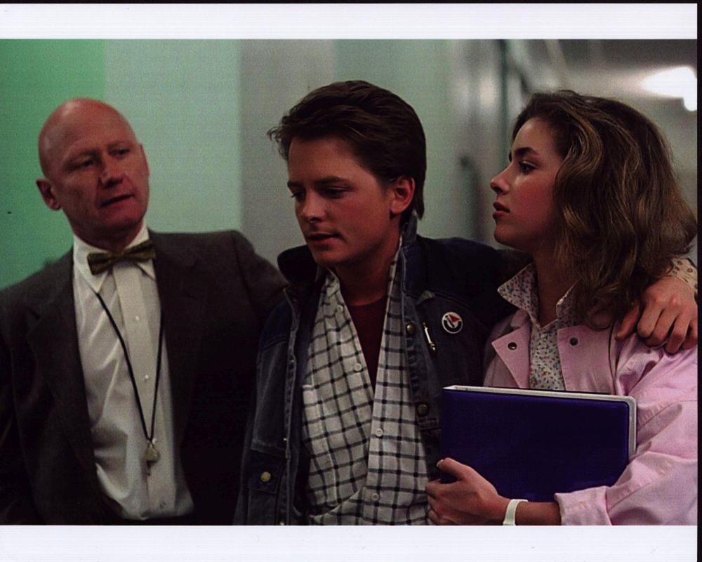 Back to the Future photo print featuring James Tolkan, Michael J. Fox, and Claudia Wells.