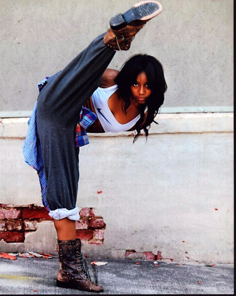 Jahnee Wallace Kicking In Sweatpants And Boots Photo Print