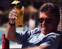 Alan Thicke holding a tropical drink photo print