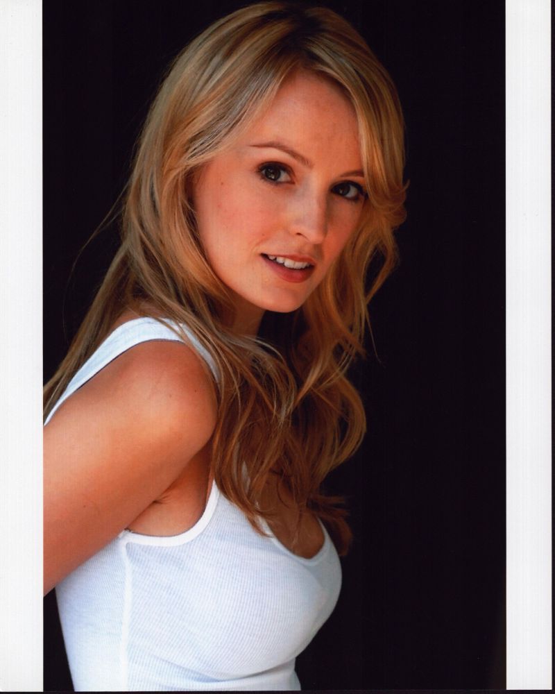 Ahna O'Reilly side view photo print in white tank top.
