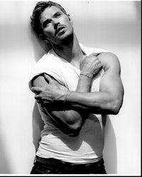 Black and white photo print of Kellan Lutz holding arms