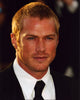 Close-up photo print of Jason Lewis in a black suit and tie.