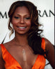 Ashanti in orange dress photo print showcasing vibrant colors.