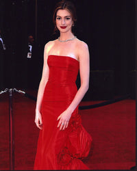 Anne Hathaway in a red strapless dress photo print.