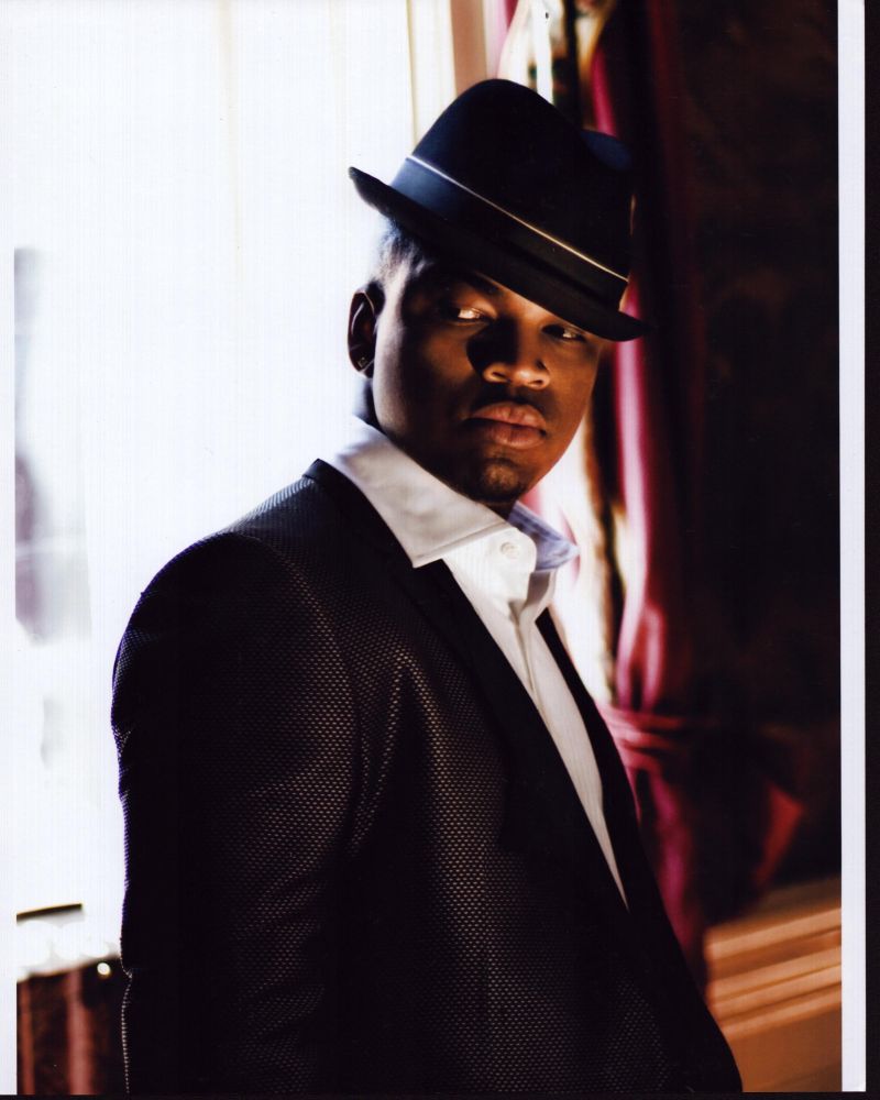 Ne-Yo photo print in textured suit and tilted hat