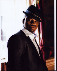 Ne-Yo photo print in textured suit and tilted hat