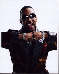 Juicy J photo print in leather trimmed robe, vibrant hip-hop artwork.