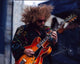 Jim James playing guitar on stage photo print