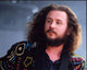 Jim James closeup photo print featuring a multi-colored jacket