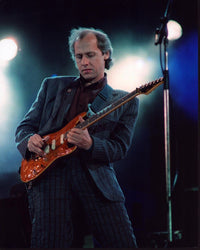 Mark Knopfler Playing Guitar in Striped Suit Photo Print